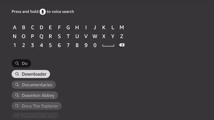 Searching Downloader on the Firestick keyboard, the app used to install IPTV Smarters Pro